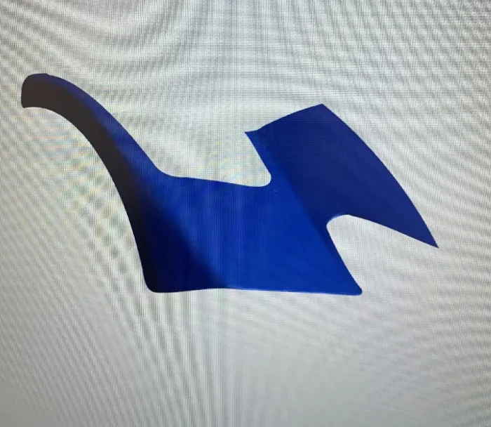 CAD surface model of the same turning vane on screen before machining