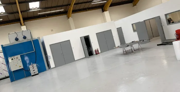The production hall at AGN Composites, with spray booth and clean room bays